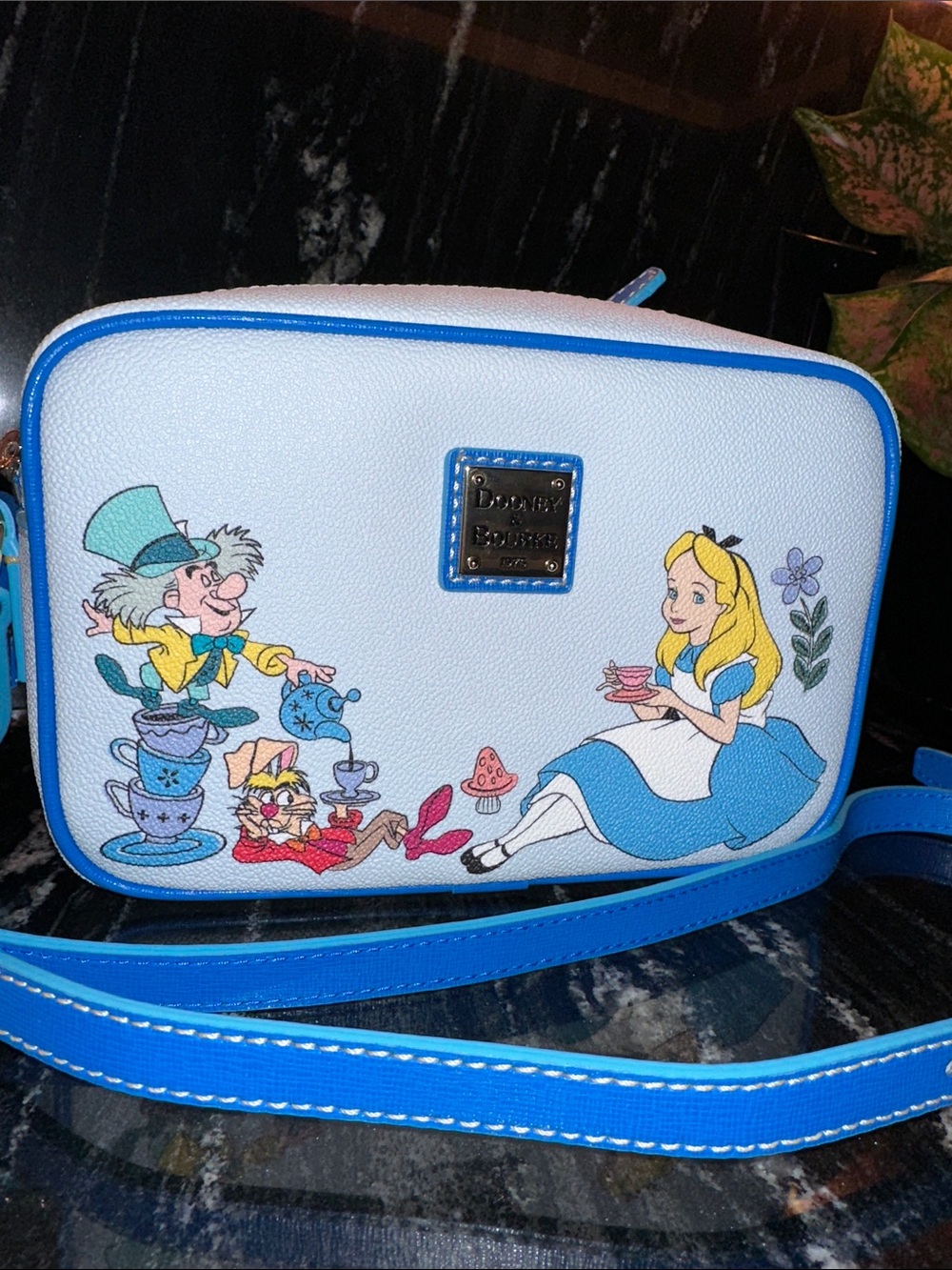 Dooney & Bourke White and Bright Blue Alice in Wonderland Crossbody Bag